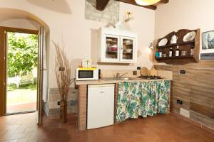 A kitchen or kitchenette at Villa le Casine by Mmega