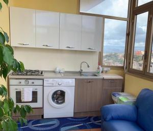 Kuchyň nebo kuchyňský kout v ubytování La Città degli Dei