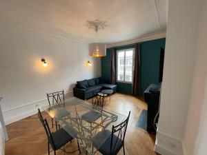 Гостиная зона в Appartement Chic F2 Centre-ville