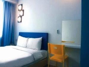 Postel nebo postele na pokoji v ubytování YY38 Hotel