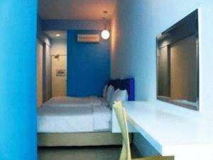 Postel nebo postele na pokoji v ubytování YY38 Hotel