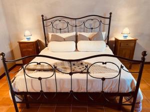 Postel nebo postele na pokoji v ubytování Cascina Stralla