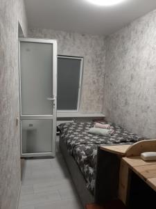 Voodi või voodid majutusasutuse Уютные апартаменты в Одесском дворике toas