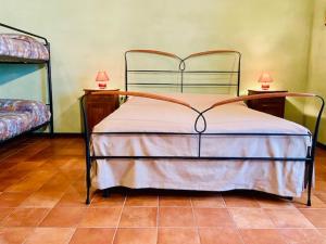 Postel nebo postele na pokoji v ubytování Cascina Stralla