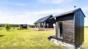 Zahrada ubytování Spithami Seaside Wooden Chalet
