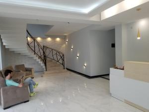 Uma área de estar em Vita Gardenia Hotel Tskaltubo