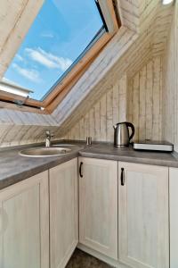 Kuchyň nebo kuchyňský kout v ubytování Kwatery Prywatne am Meer