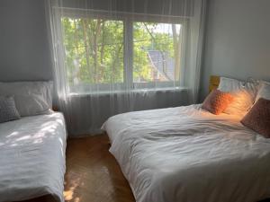 Posteľ alebo postele v izbe v ubytovaní BONI Apartman + 37 fotografií