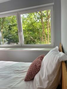 Posteľ alebo postele v izbe v ubytovaní BONI Apartman