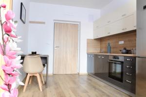 Kuchyňa alebo kuchynka v ubytovaní Apartmány U Jelena 2