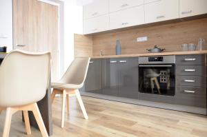 Kuchyňa alebo kuchynka v ubytovaní Apartmány U Jelena 2