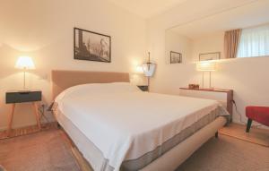 Posteľ alebo postele v izbe v ubytovaní Residenza I Melograni - Suite