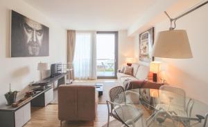 Televízia a/alebo spoločenská miestnosť v ubytovaní Residenza I Melograni - Suite