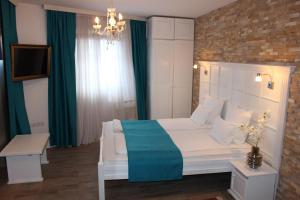 Een bed of bedden in een kamer bij Hotel-Restaurant Kriva Ćuprija