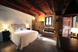 Tempat tidur dalam kamar di Borgo Selvapiana
