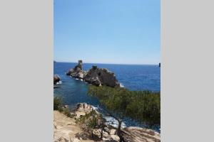 a view of the ocean from a cliff at Calanques de Sormiou in Marseille