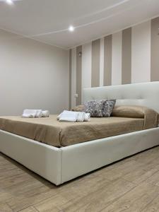 A bed or beds in a room at Case vacanza Sole e Luna