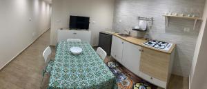 A kitchen or kitchenette at Case vacanza Sole e Luna