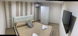 A bed or beds in a room at Case vacanza Sole e Luna