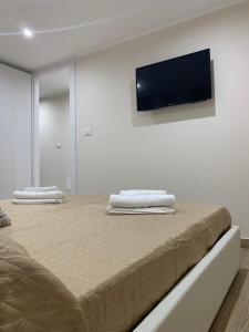 A bed or beds in a room at Case vacanza Sole e Luna