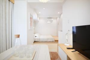 TV a/nebo společenská místnost v ubytování Designers Hotel Siesta