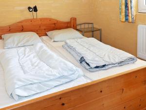 En eller flere senge i et værelse på 6 person holiday home in Storvorde