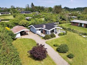 an aerial view of a house with a yard at Three-Bedroom Holiday home in Spøttrup 3 in Lihme