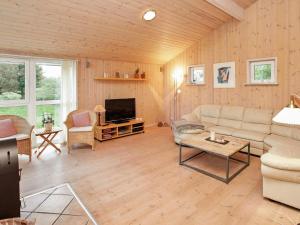Seating area sa 8 person holiday home in Strandby