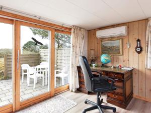 an office with a desk and a chair at 5 person holiday home in Fan in Fanø