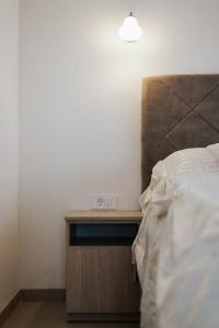 Postel nebo postele na pokoji v ubytování Apartman KALIC