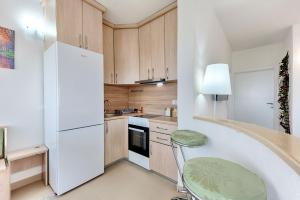 Kuchyň nebo kuchyňský kout v ubytování Apartman KALIC