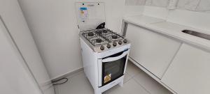 Kitchen o kitchenette sa Casa à Beira-Mar com internet em Arembepe