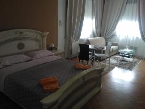 Postel nebo postele na pokoji v ubytování B&B in Arena L' Opera