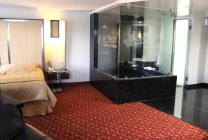 Ein Bett oder Betten in einem Zimmer der Unterkunft Hotel Scala Magna