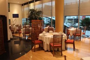 Ein Restaurant oder anderes Speiselokal in der Unterkunft Hotel Scala Magna 