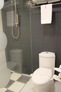 Ein Badezimmer in der Unterkunft Hotel Scala Magna