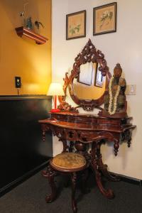 a dressing table with a mirror on top of it at The Rosemary in Los Angeles