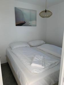 Ein Bett oder Betten in einem Zimmer der Unterkunft Haus Kleinbichler