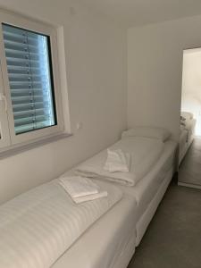 Ein Bett oder Betten in einem Zimmer der Unterkunft Haus Kleinbichler