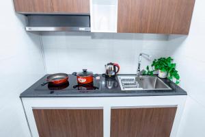 Eldhús eða eldhúskrókur á Trần Đạt Hotel