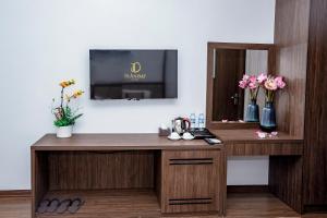 Sjónvarps- og/eða afþreyingartæki á Trần Đạt Hotel