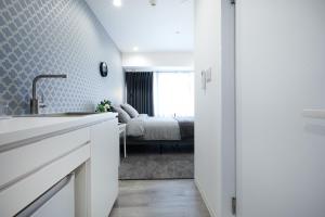 Postel nebo postele na pokoji v ubytování Designers Hotel Siesta