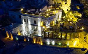 an aerial view of a castle at night at Wings Cappadocia in Uçhisar