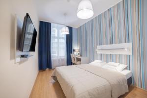 Posteľ alebo postele v izbe v ubytovaní Hotel Traffic Wrocław Stare Miasto
