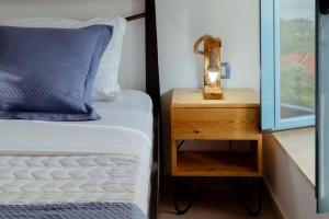 Postel nebo postele na pokoji v ubytování Alex Boutique Hotel