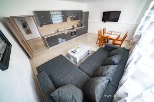 Kuchyňa alebo kuchynka v ubytovaní Apartmány na Šumavě