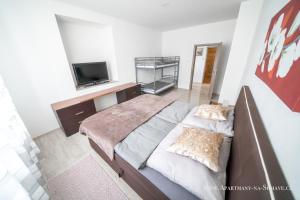 Posteľ alebo postele v izbe v ubytovaní Apartmány na Šumavě