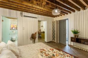 Postel nebo postele na pokoji v ubytování Two Wells Zimmer Suite