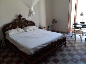 Posteľ alebo postele v izbe v ubytovaní maison vue sur la mer casamore