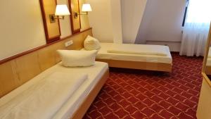 Postel nebo postele na pokoji v ubytování Montana Hotel